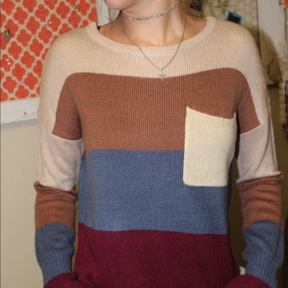 Pink owl Tan/maroon/blue sweater.